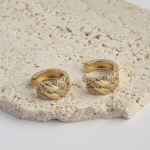18k gold-tone wide huggie earrings featuring a textured Cuban link design with alternating polished gold and pavé crystal sections.