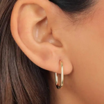 A pair of medium-sized, polished gold-tone hoop earrings featuring a modern, elongated rectangular silhouette that hangs gracefully from the earlobe