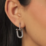 Sleek silver-tone U-shaped link huggie earrings featuring a brilliant pavé-crystal finish