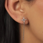 A pair of elegant silver-tone stud earrings featuring four marquise-cut crystals arranged in a delicate, symmetrical floral silhouette