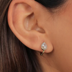 A modern silver-colored link-style hoop earring featuring a smooth, polished surface accented with a central band of shimmering pave-set crystals